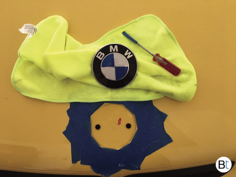 BMW hood roundel emblem removal procedure